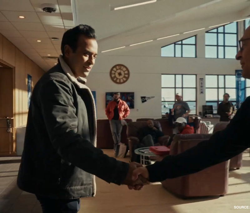 Vivek shakes hands with a male constituent